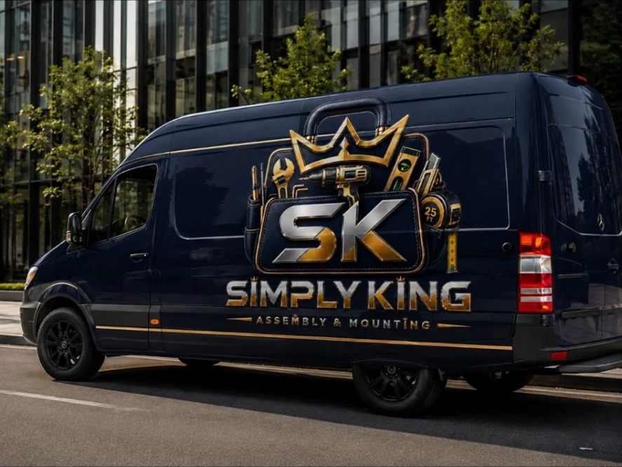 Rear view of the Simply King van showing the full crown and tool-bag logo